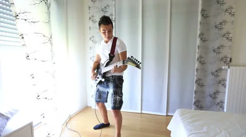 Playing guitar 8 Stock Footage 25423742