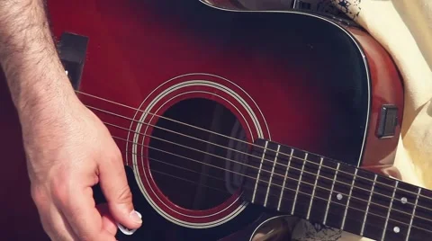 Playing a guitar on the beach Stock Footage 57897775