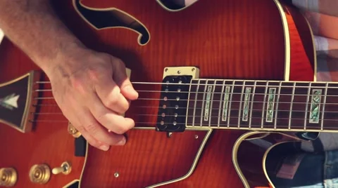 Playing a guitar on the beach Stock Footage 57897988