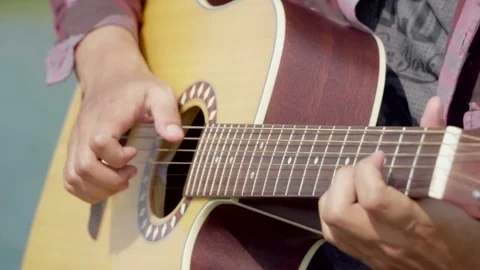 Playing guitar close up 스톡 동영상 83655609