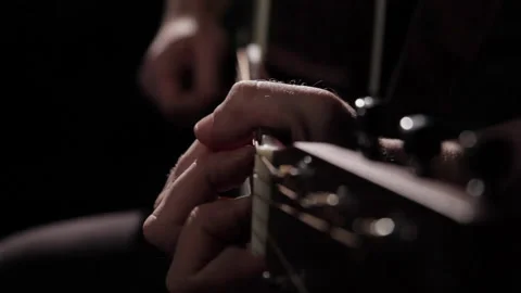 Playing guitar close up Stock Footage 150974463