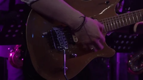Playing the guitar at the concert Stock-Footage 72670960