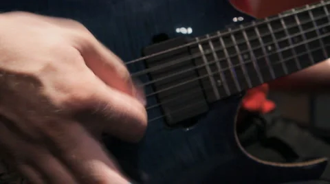 Playing on guitar Stock Footage 5903254
