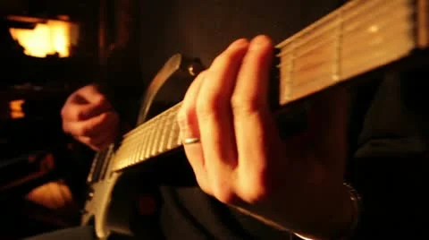 Playing guitar Stock-Footage 10837655