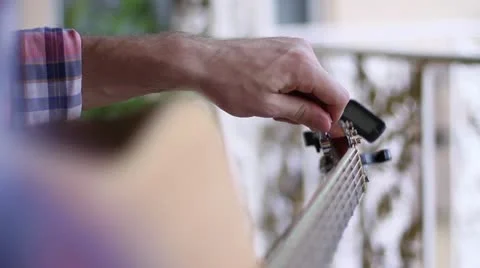 Playing the Guitar Video stock 21251878