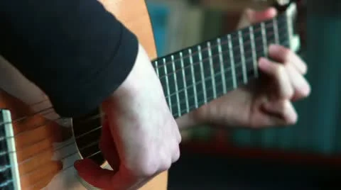 Playing guitar Stock Footage 22152613
