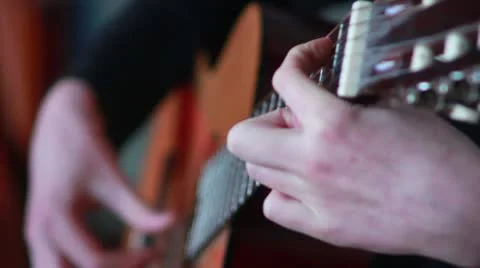 Playing guitar Stock Footage 22152624