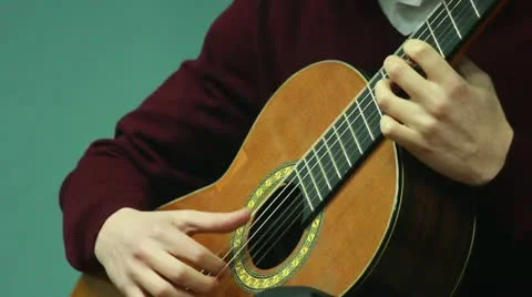 Playing guitar Stock Footage 22152695