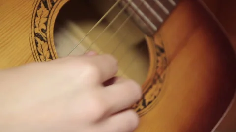 Playing the guitar Stock Footage 34685168