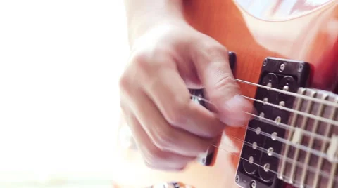 Playing guitar Stock Footage 56196245