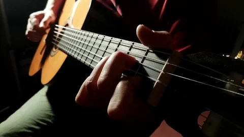 Playing guitar 库存影片 76549175