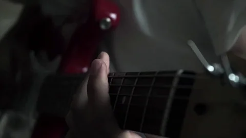 Playing guitar Stock Footage 78039395