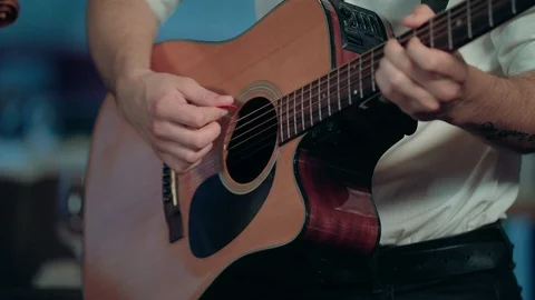 Playing guitar Stock Footage 89968476