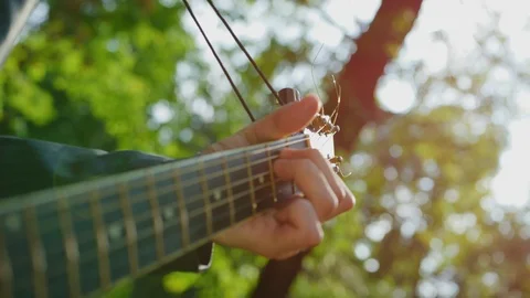 Playing the guitar Stock Footage 99966032