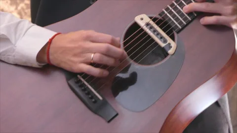 Playing guitar Stock Footage 100843553