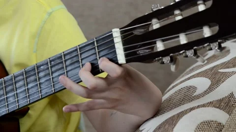 Playing guitar Stock Footage 152803226