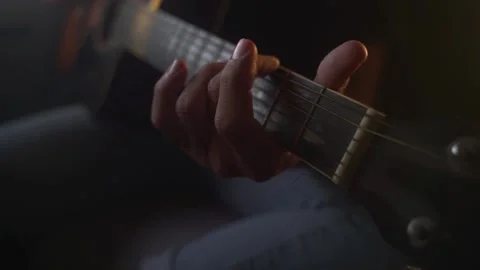 Playing guitar Stock Footage 234730315