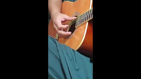 Playing guitar Stock Footage 271122990