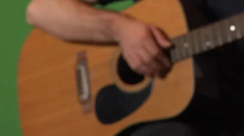 Playing Guitar on Greenscreen Stock Footage 32899791