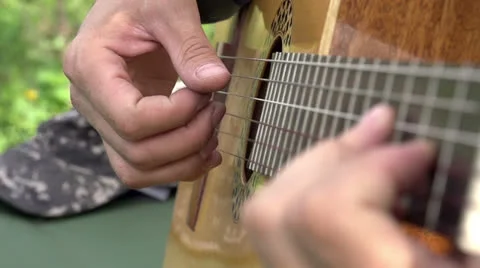 Playing the Guitar HD Stock Footage 22982643