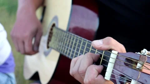 Playing guitar on a hike Video stock 139458196