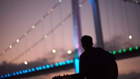 Playing guitar lighting bridge Stock-Footage 273698795