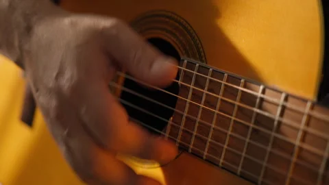 Playing Guitar. Musician Strumming On Strings By Hand On Acoustic Guitar 库存影片 344566507