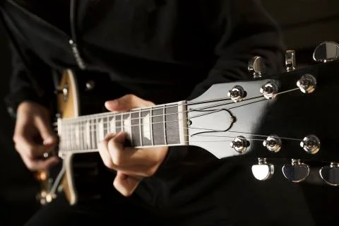 Playing guitar Stock Photos