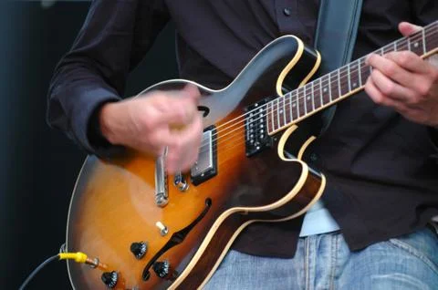Playing guitar Stock Photos