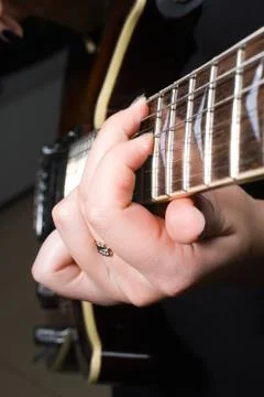 Playing on guitar Stock Photos