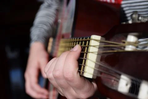 Playing the guitar Stock Photos