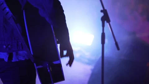 Playing guitar at show Stock Footage 101112227