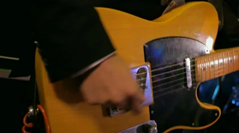 Playing guitar slow motion Video stock 65187611