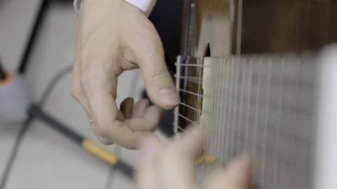 Playing guitar. Slow motion Stock Footage 114633780