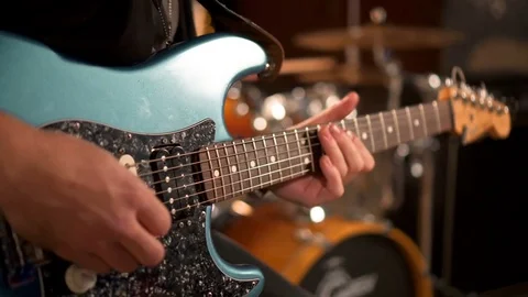 Playing guitar solo. Beautiful light Stock Footage 83202436