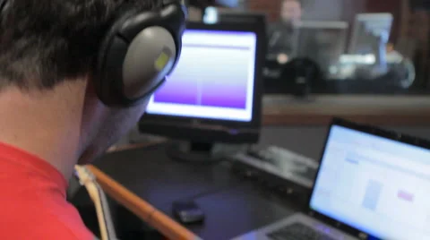 Playing guitar in a sound studio Video stock 6930448