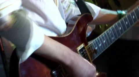 Playing guitar on stage Stock Footage 50045594