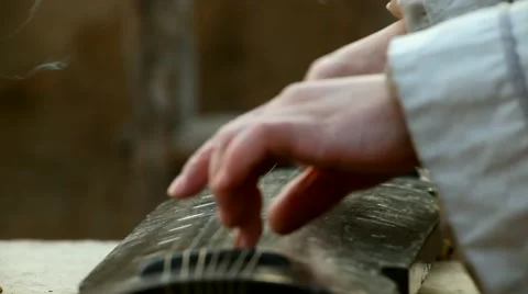Playing the guqin Video stock 60590689