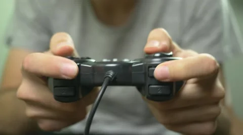 Playing Hands On Video Game Controller Closeup HD Stock Footage 45030879