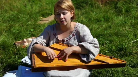 Playing harp instrument Stock Footage 90854482
