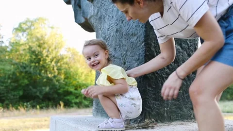 Playing hide and seek with mom Stock Footage 288075130