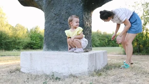 Playing hide and seek with mom Stock Footage 288075936