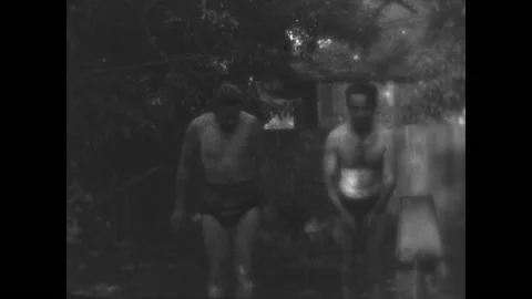 Playing In a Homemade Pool 1938 Stock Footage 225582491