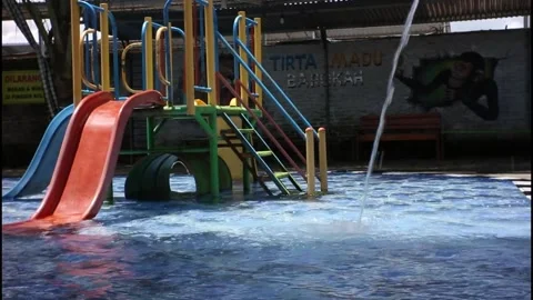 Playing in the hot spring pool arena Stock Footage 233821261