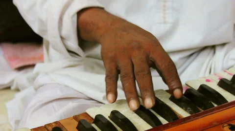 Playing indian harmonium in masjid Stock Footage 50428626