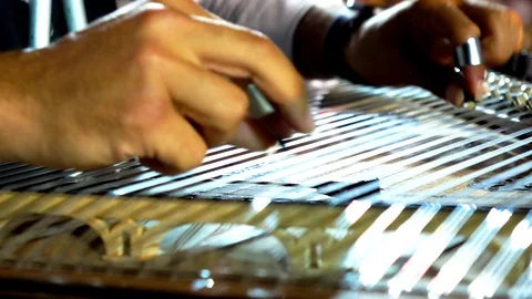 Playing kanun in close up, spectators behind Video stock 113212836