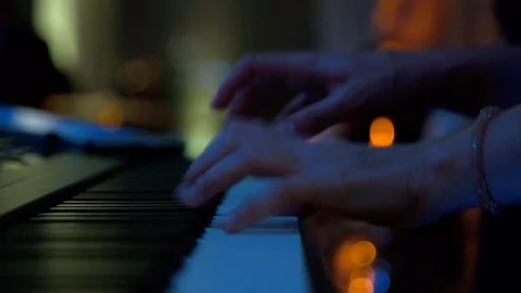 Playing Keyboard At A Party Stock Footage 129620273