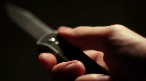 Playing With Knife Stock Footage 61185715