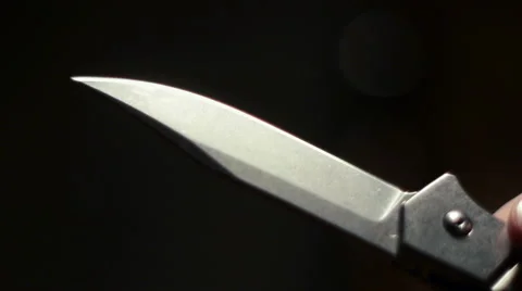 Playing With Knife Stock Footage 61185885