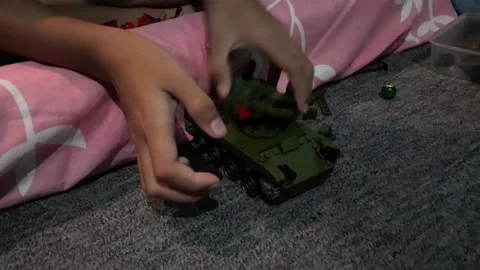 Playing with lego in the form of a tank 스톡 동영상 218061150